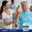 Older woman lifting a yellow dumbbell with a younger woman's help, next to Calcium Citrate powder.