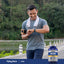 A smiling man walks outdoors, checking his smartwatch with a white towel around his neck and an MSM bottle beside him.