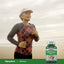 An older woman running on a beach with a bottle of Triphala nearby.